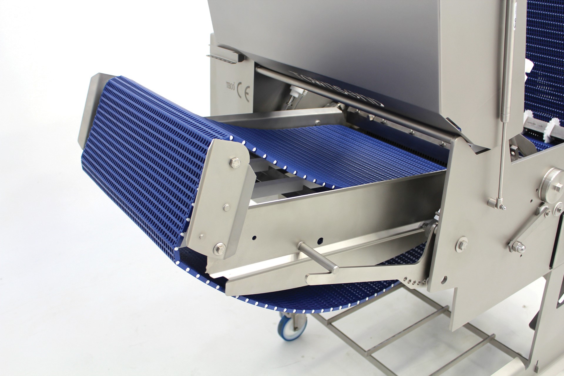 Infeed and exit conveyor are open designs with modular belting to ensure easy to breakdown for sanitation