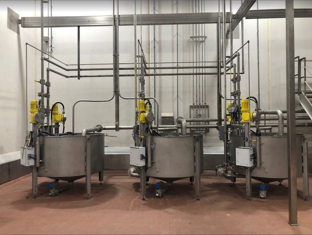 Vacuum transport in a poultry processing plant