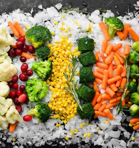 Fresh vegetables are packed and displayed using flake ice from a MAJA flake ice machine