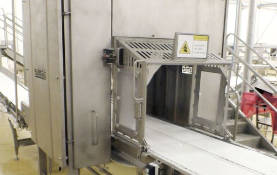 carcass cutter for primal cutting system in pork processing