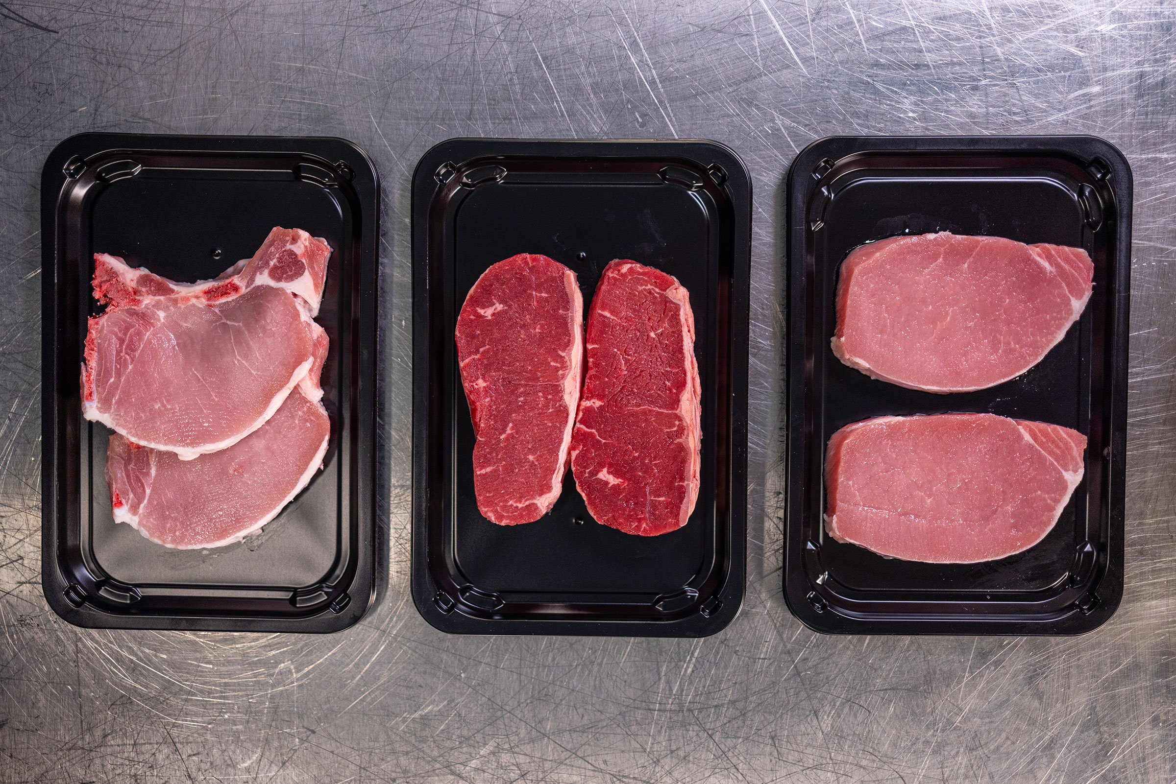 Portioning Various Meat Products Trays